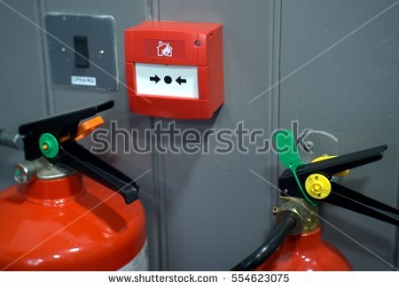 stock-photo-fire-alarm-box-on-wooden-grey-wall-and-two-fire-extinguisher-and-security-system-button-554623075
